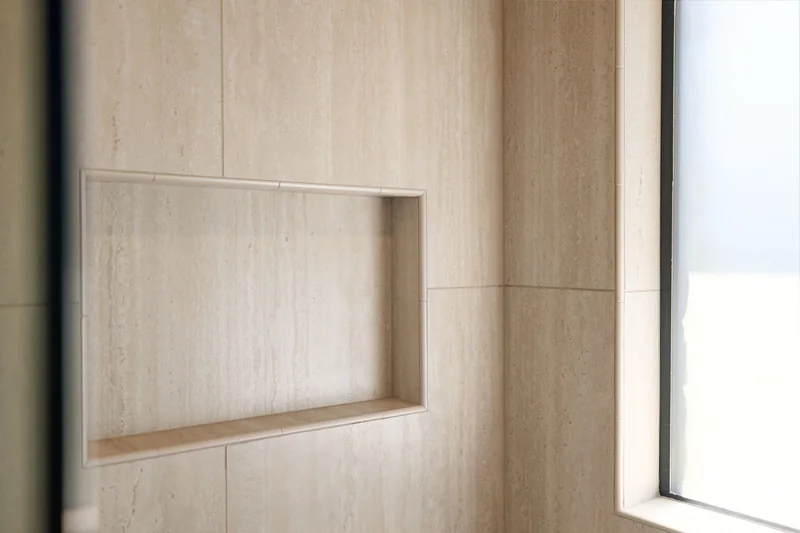 Recessed shower niche and wall tile